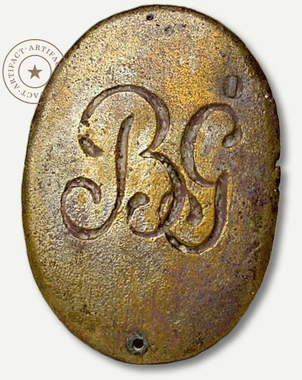 An anitque military insignia tag from the San Jacinto Battlefield