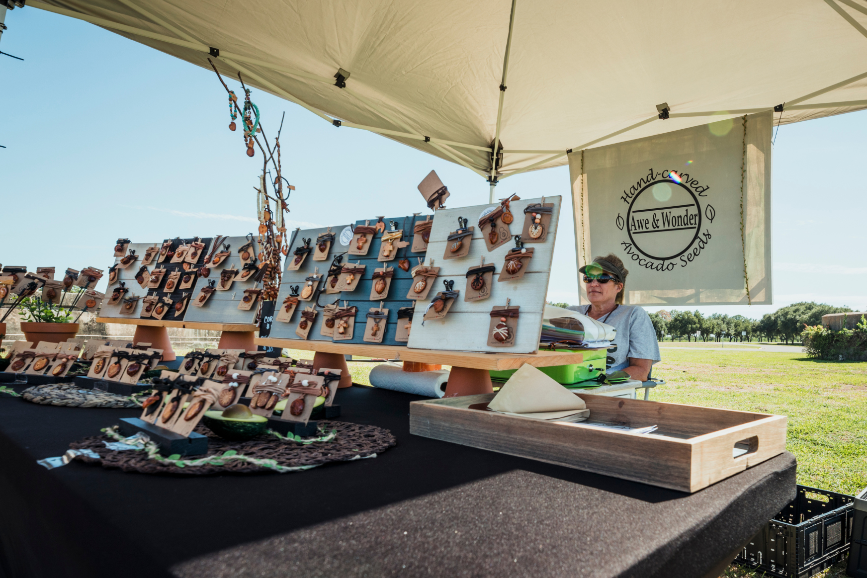 Market vendor selling handcrafted items.